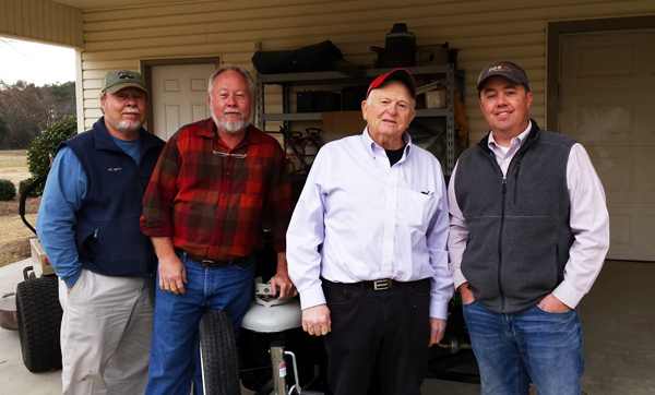 New owners of a Carolina Pig Cookers grill, in Lumberton, North Carolina.