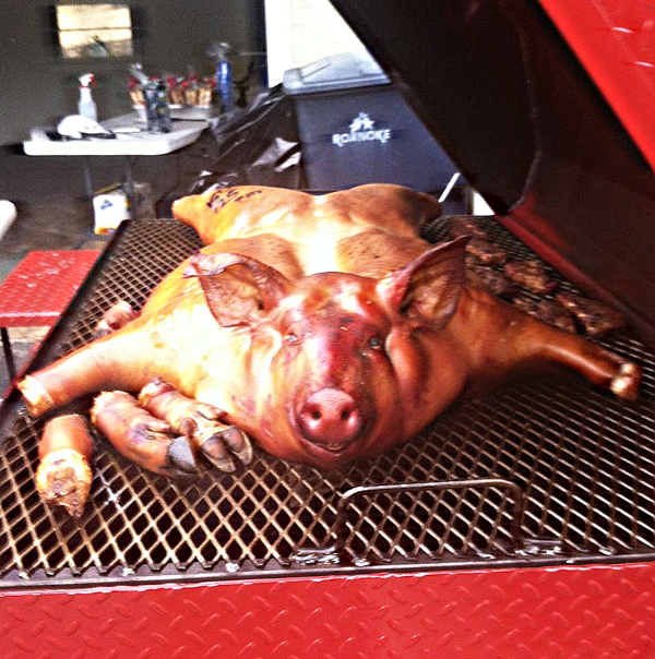 Whole hog cooking on the Carolina Pig Cookers grill.