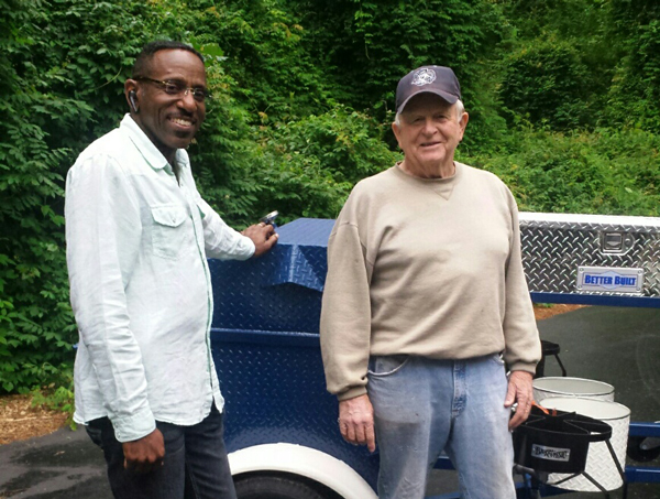 Garfield, from Raleigh, with his new Carolina Pig Cookers grill.