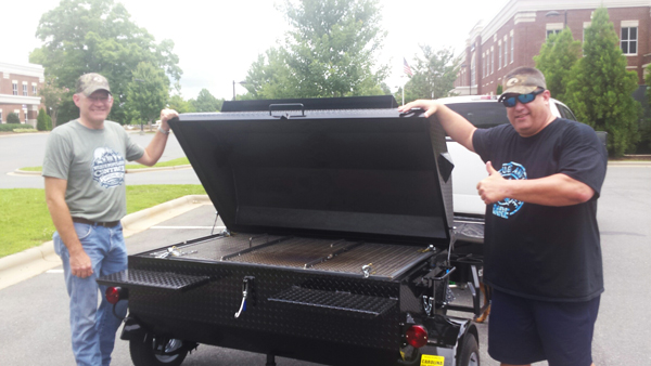 Waxhaw Police Department, new owners of a Carolina Pig Cookers grill.