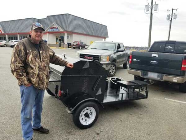 Bobby W. with his new Carolina Pig Cookers grill.